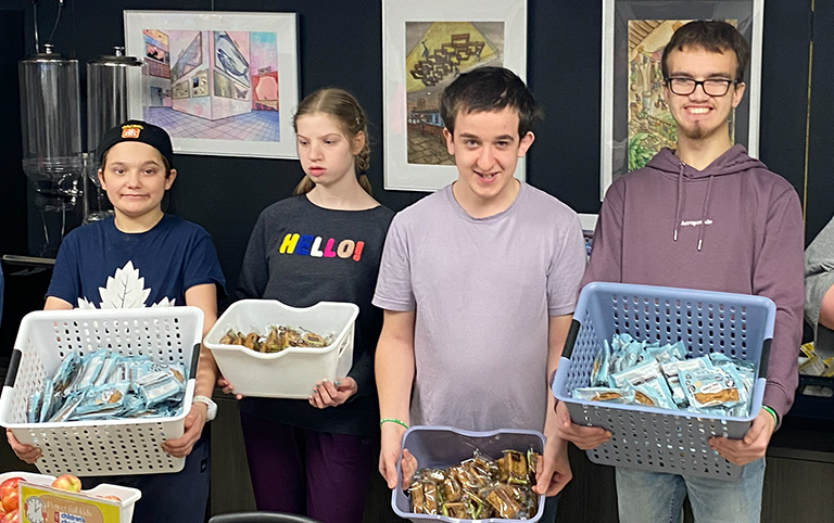 Students prepare to deliver healthy snacks at EESS