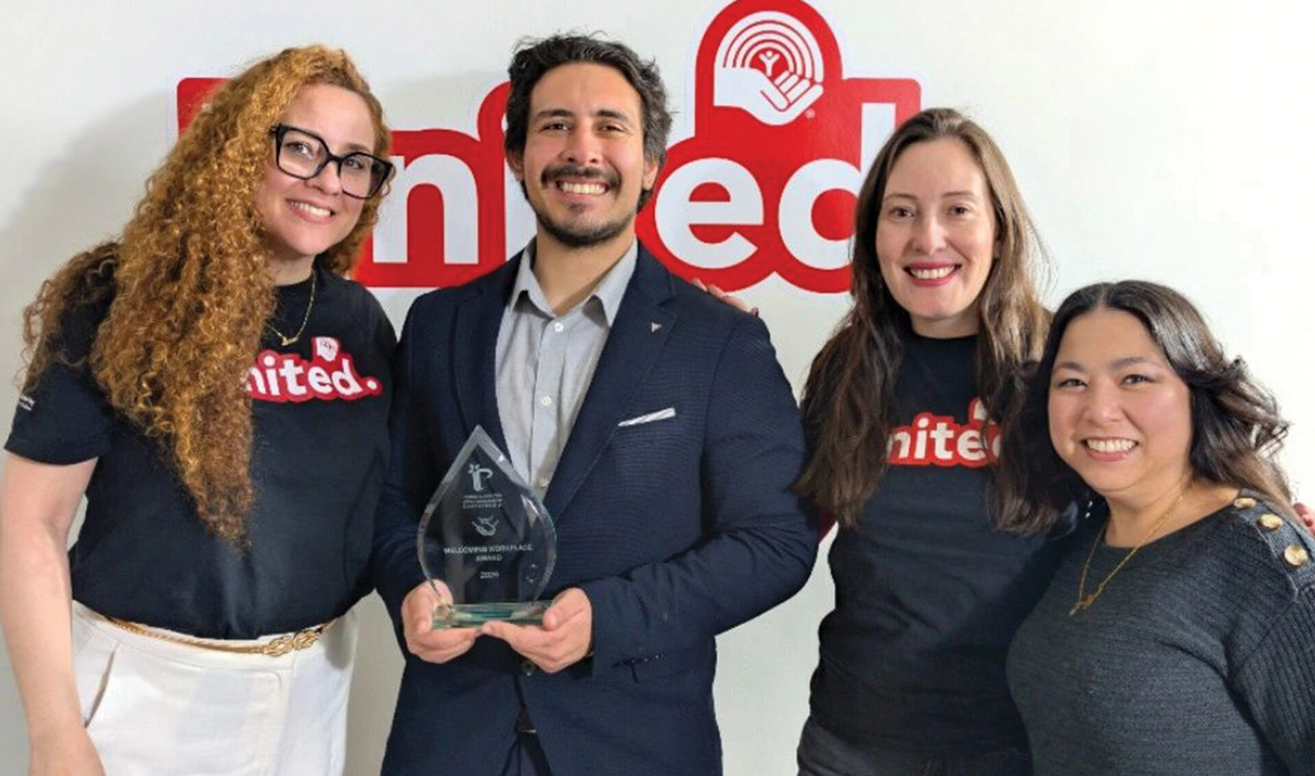 United Way staff Accepting the 2026 “Welcoming Workplace” award on behalf of United Way from the London Middlesex Local Immigration Partnership