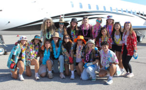 AB Lucas team 3 posing in front of the plane